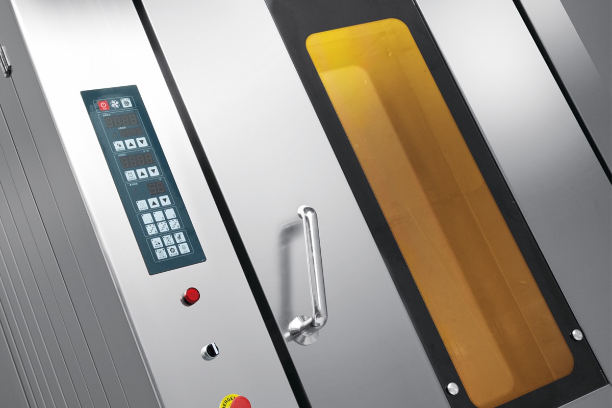 How does a rotary rack oven work?